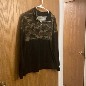quarter zip camo and black shirt